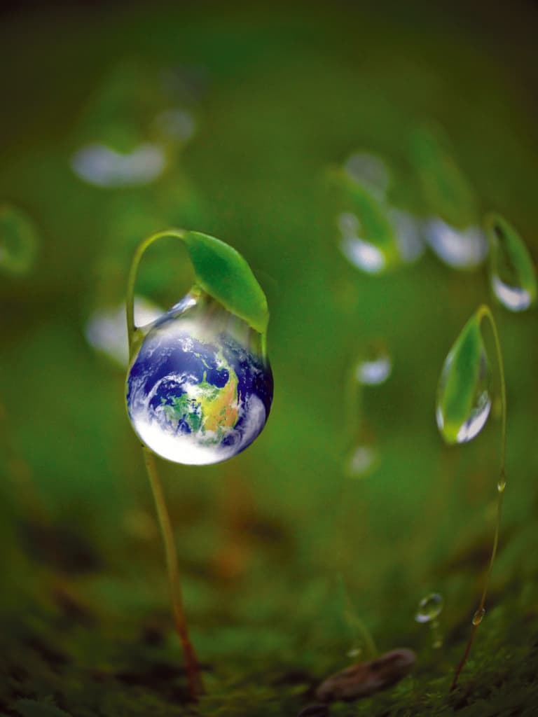 Green energy concept, Fresh Earth in a water drop