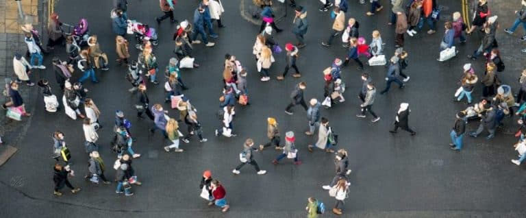 Pedestrian crowds crossing the street – photographed from directly above