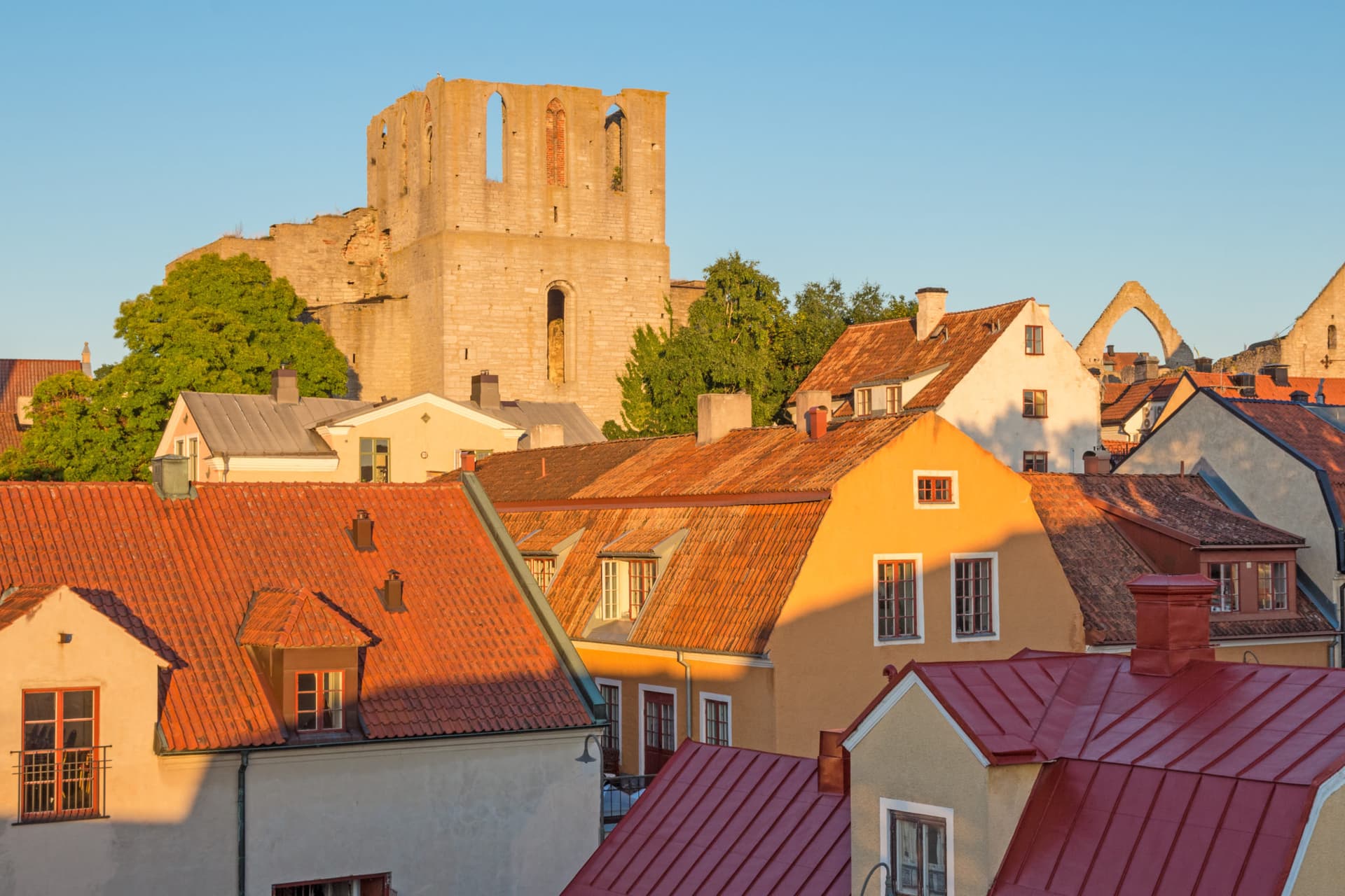Rooftops and a medieval fortress in Visby, Sweden