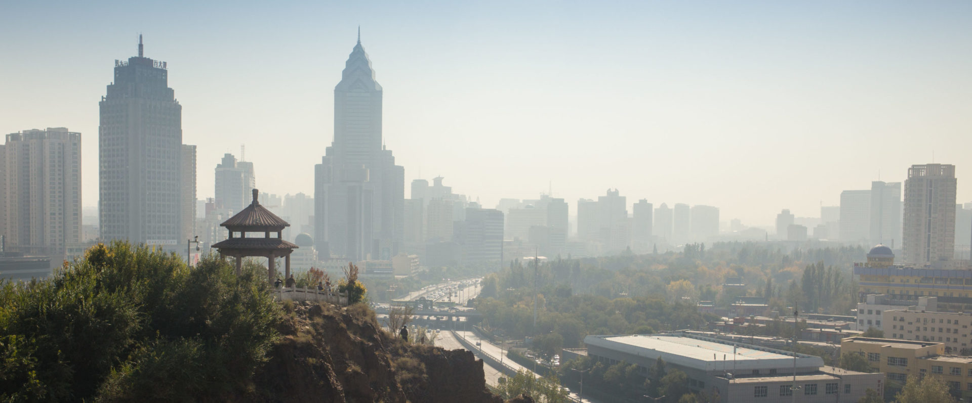 Chinese city with a gazebo in the foreground