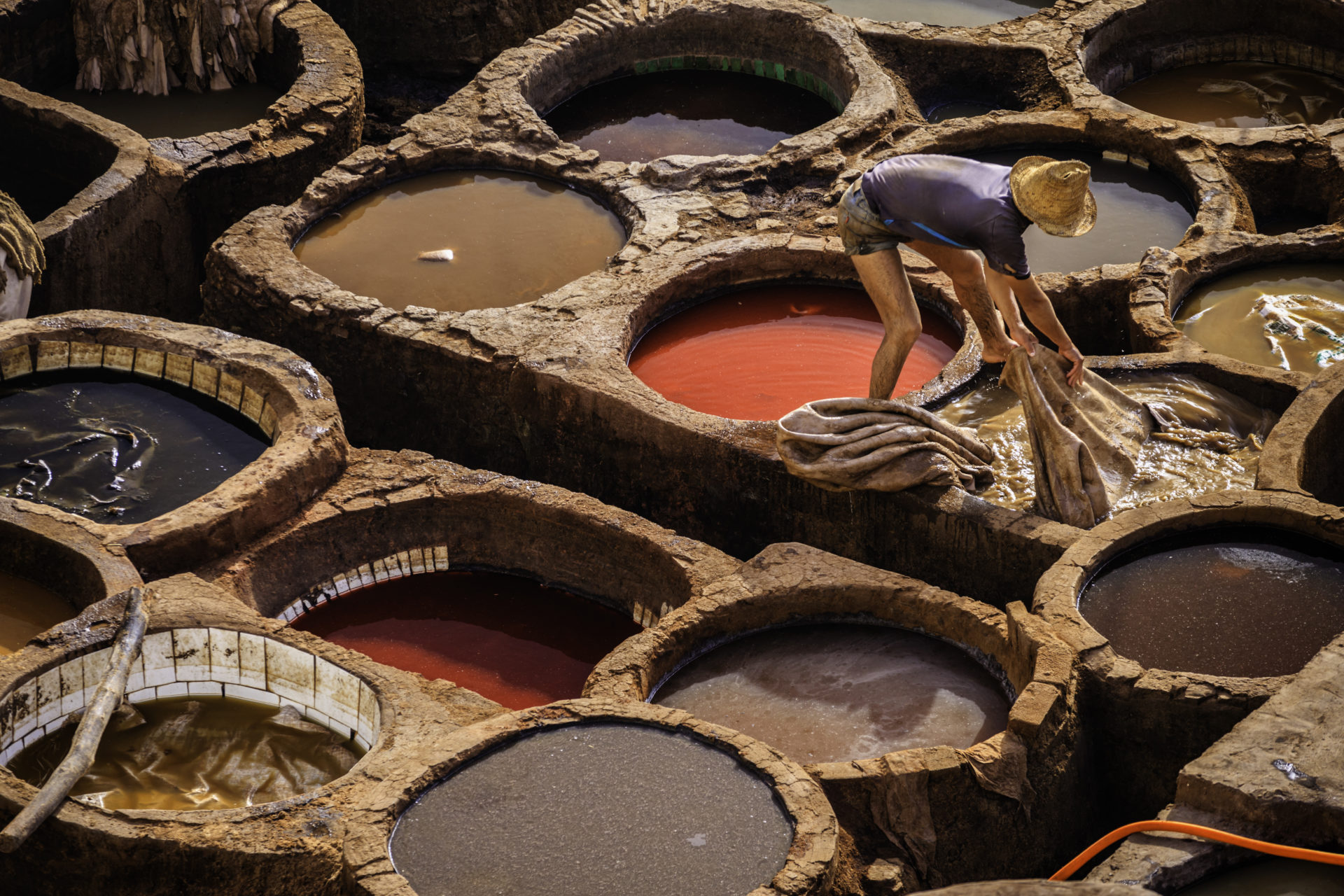 Man working in the tannery, Fez, Morocco