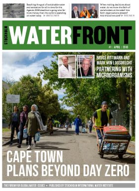 WaterFront cover showing a sunny street with people walking