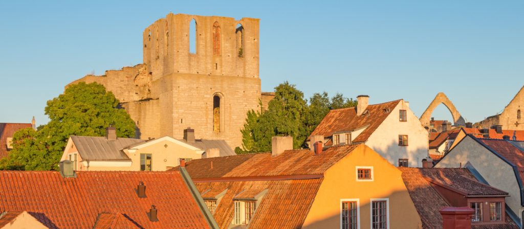 Rooftops and a medieval fortress in Visby, Sweden