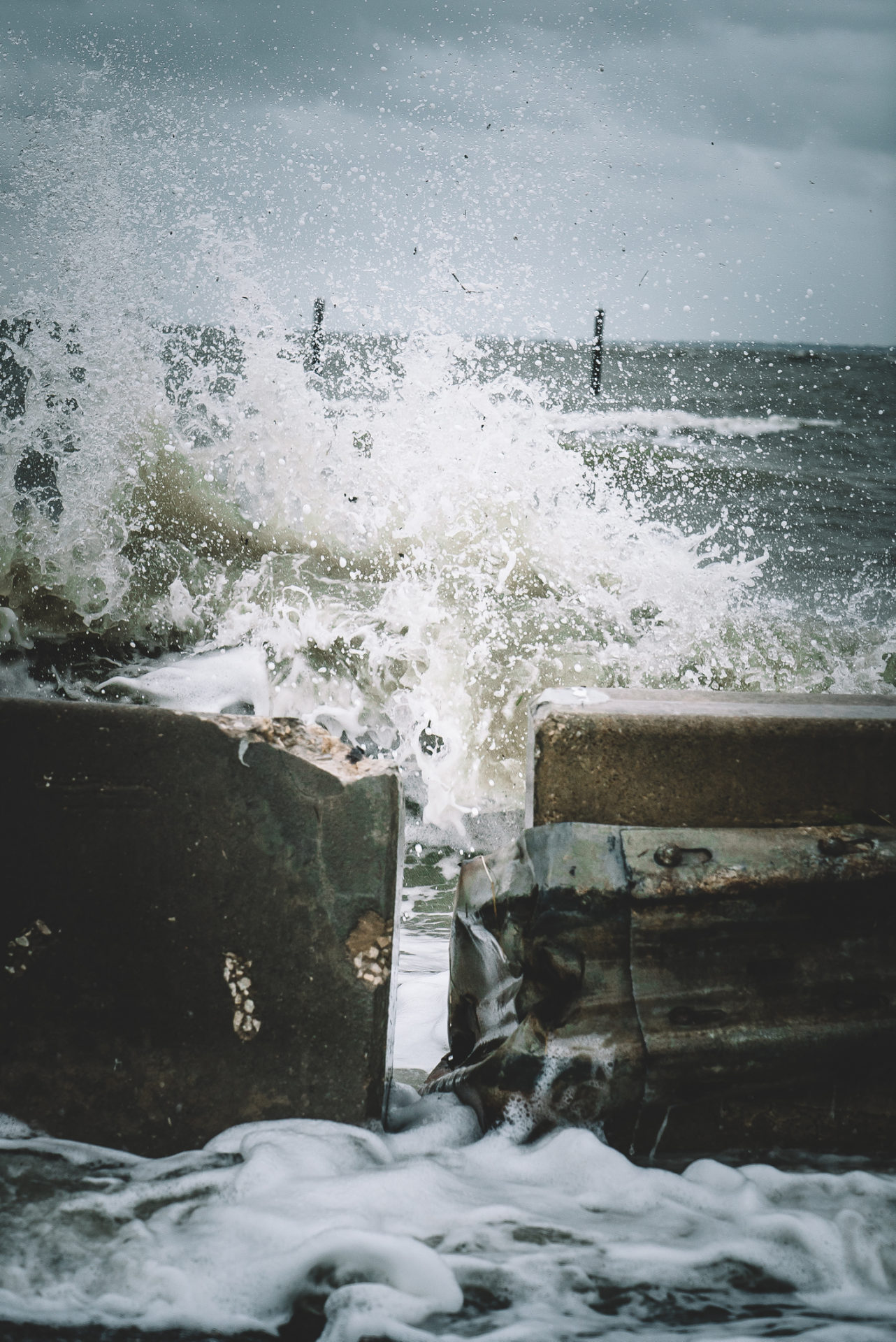 Water crashing over bridge during Hurricane