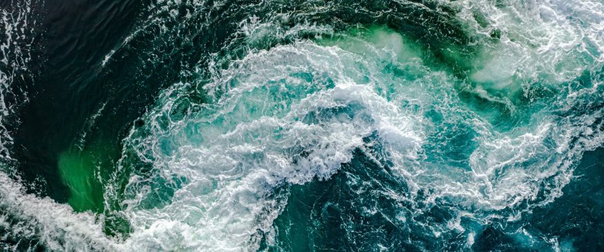 Waves of water of the river and the sea meet each other during high tide and low tide.