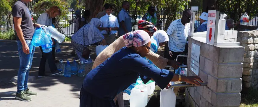 8 February 2018 - Cape Town, South Africa : Capetonians queue for water as their taps threaten to ru