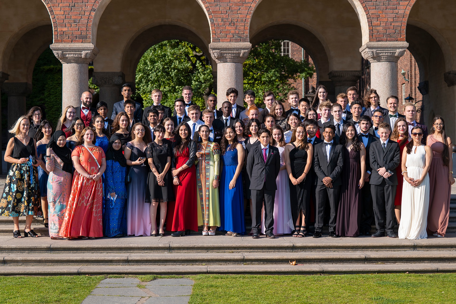 2019 Stockholm Junior Water Prize finalists standing in front of Stockholm's City Hall