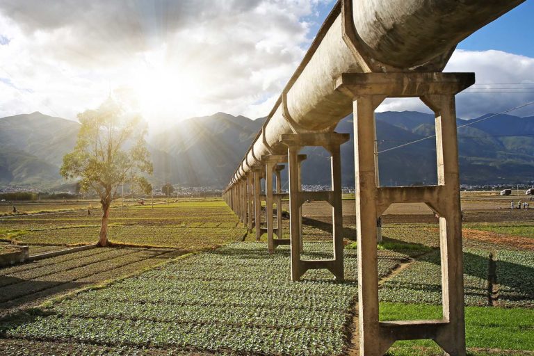 Modern aqueduct marches across Chinese agricultural landscape.