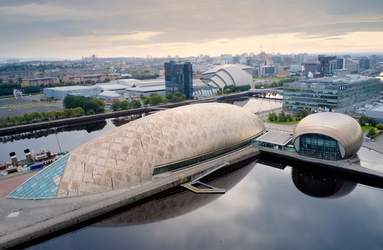 Glasgow, Scotland UK - August 24th 2019: Aerial view of Glasgow science centre, SECC and Hydro Area on the river Clyde waterfront at sunrise Photo: Richard Johnson / Shutterstock