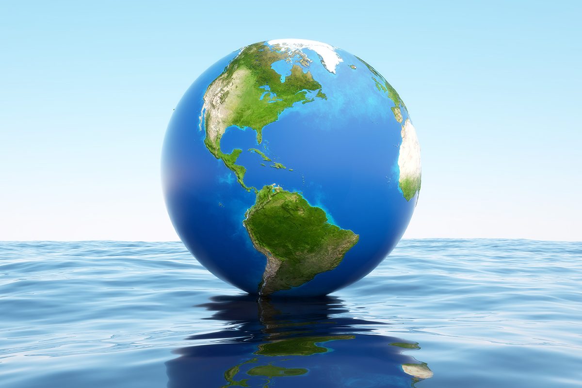 3d globe on the water. Elements of this image furnished by NASA.
