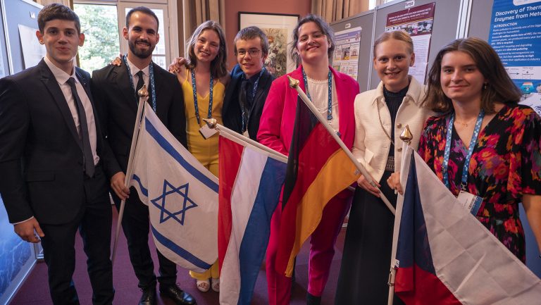 Young people standing with their national flags, namely, Israel, the Netherlands, Germany and Czech Republic.