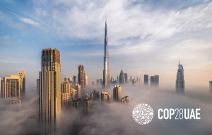 Skyscrapers of the city of Dubai through low clouds