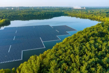 Aerial top view of environmentally friendly energy with floating solar panels platform system on the